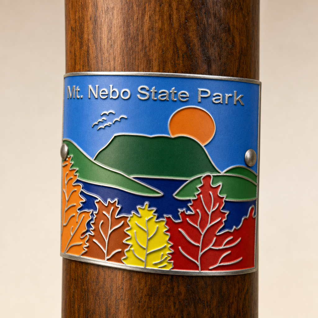 Mt. Nebo State Park hiking stick medallion installed on a wooden hiking staff