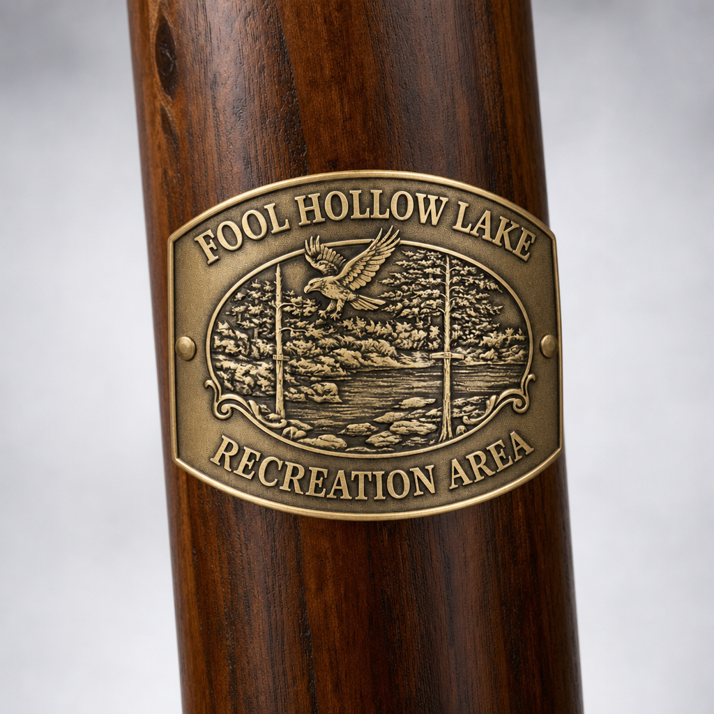 Fool Hollow Lake State Recreation Area hiking stick medallion installed on a wooden hiking staff
