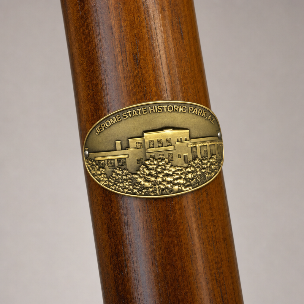 Jerome State Historic Park hiking stick medallion installed on a wooden hiking staff
