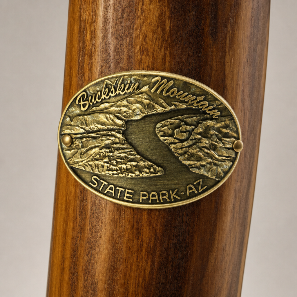 Buckskin Mt. State Park hiking stick medallion installed on a wooden hiking staff