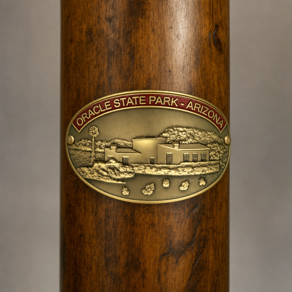 Oracle State Park hiking stick medallion installed on a wooden hiking staff