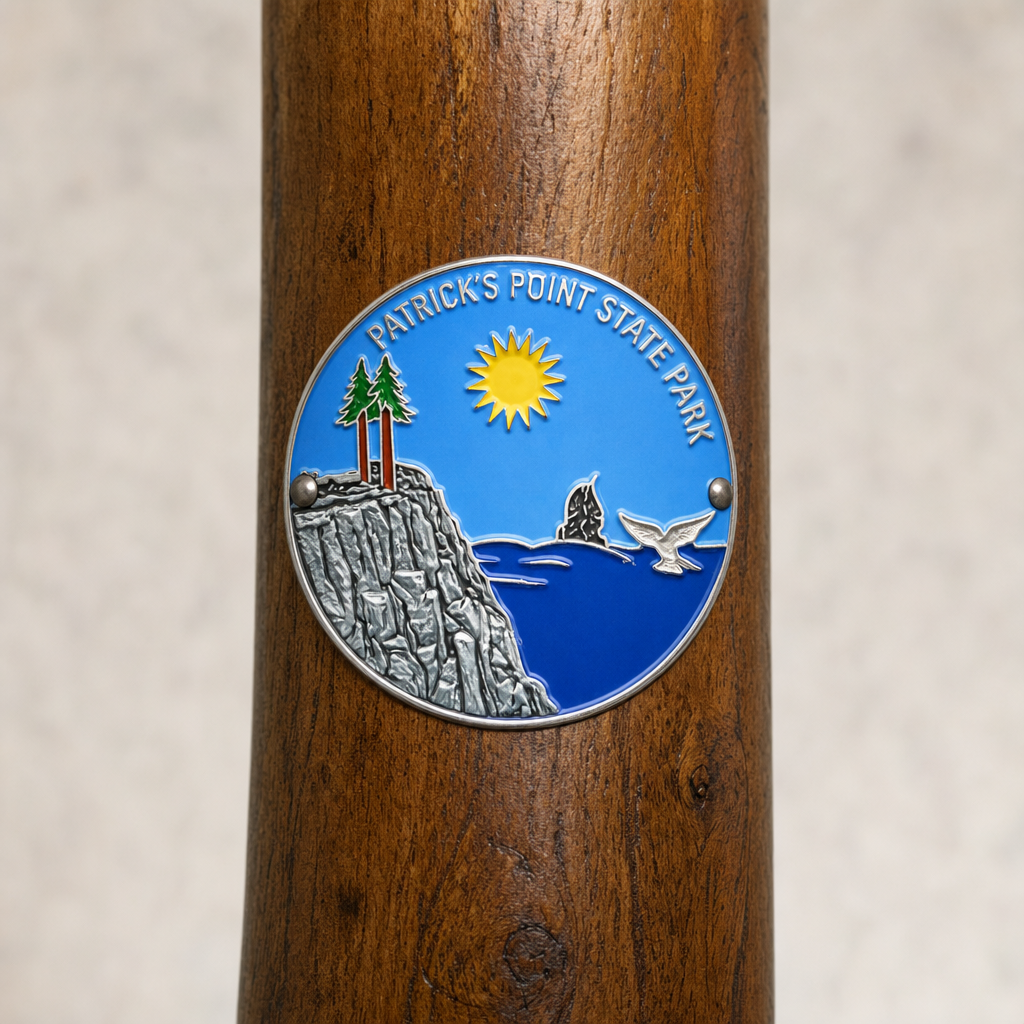 Patricks Point State Park hiking stick medallion installed on a wooden hiking staff