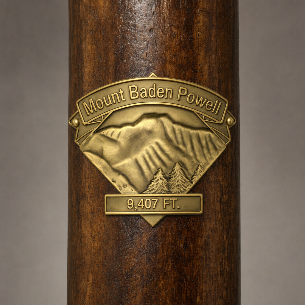 Mt. Baden Powell hiking stick medallion installed on a wooden hiking staff