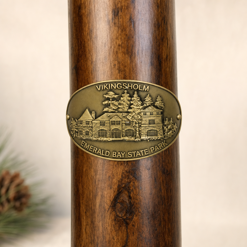 Vikingsholm State Park hiking stick medallion installed on a wooden hiking staff