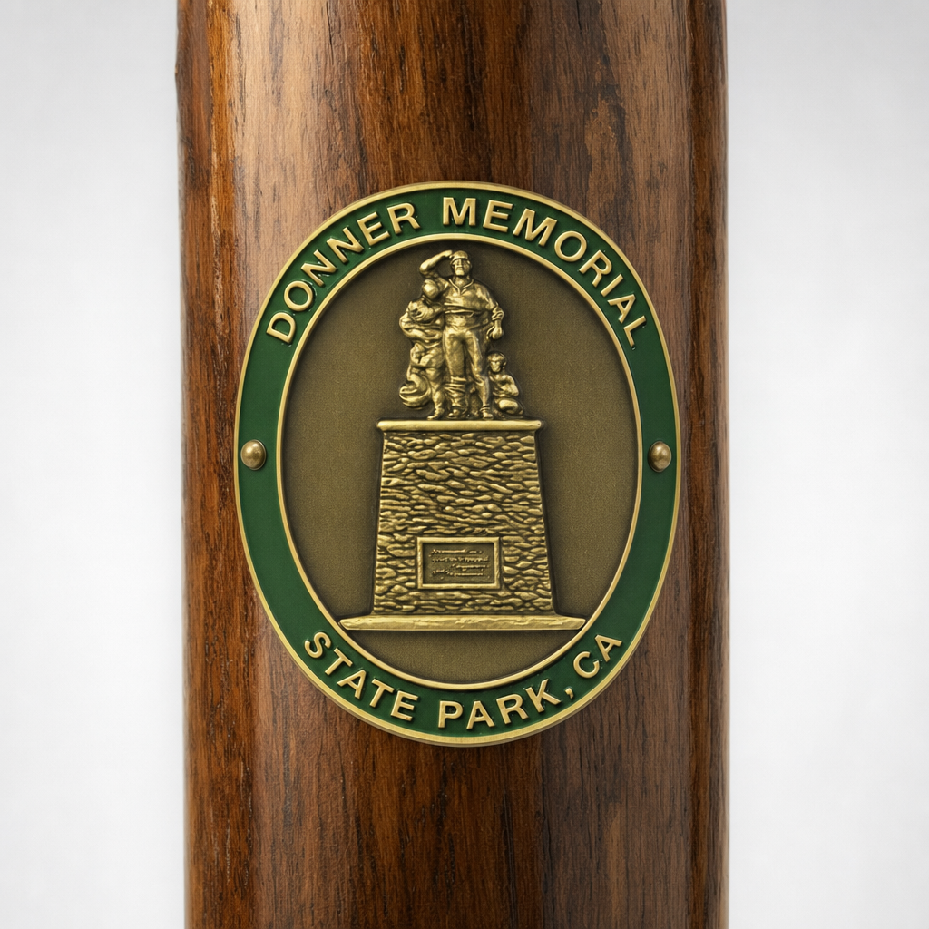 Donner Memorial State Park hiking stick medallion installed on a wooden hiking staff