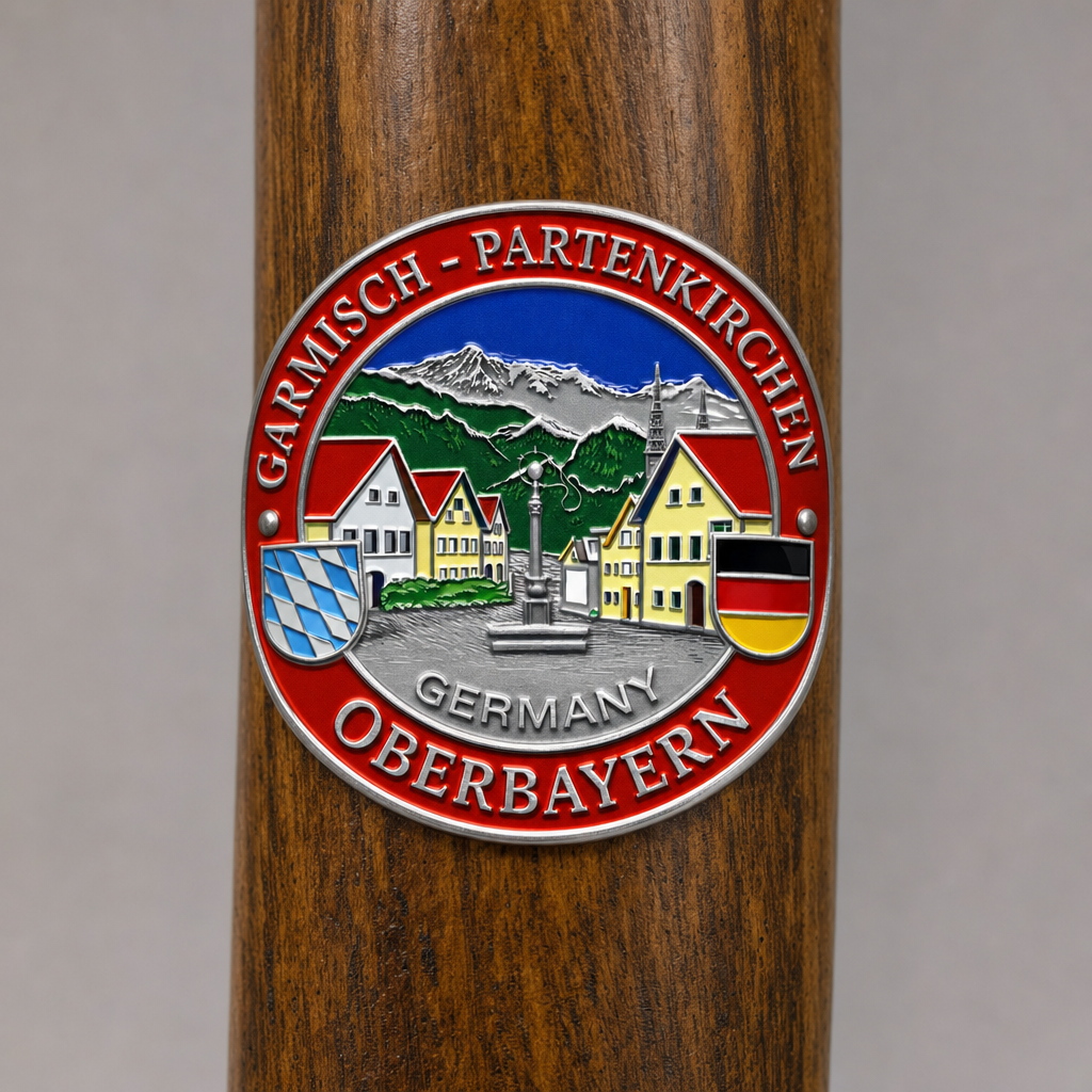 Garmisch-Partenkirchen hiking stick medallion installed on a wooden hiking staff
