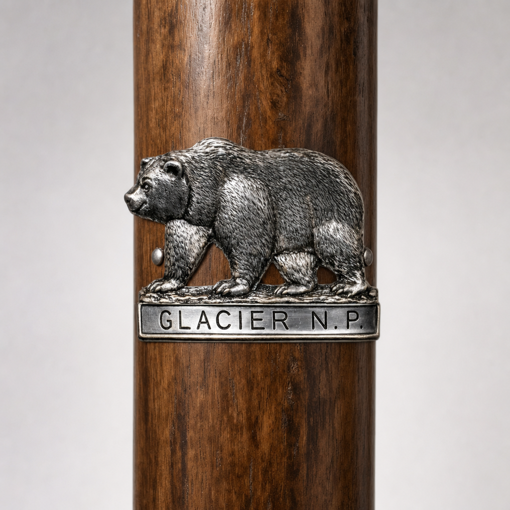 Glacier National Park National Park Bear hiking stick medallion installed on a wooden hiking staff