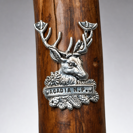 Acadia National Park Deer hiking stick medallion installed on a wooden hiking staff
