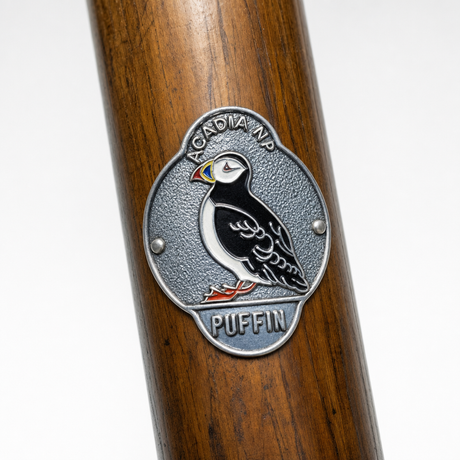 Acadia National Park Puffin Bird hiking stick medallion installed on a wooden hiking staff