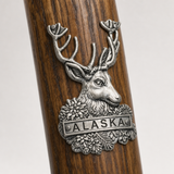 Alaska Deer hiking stick medallion installed on a wooden hiking staff