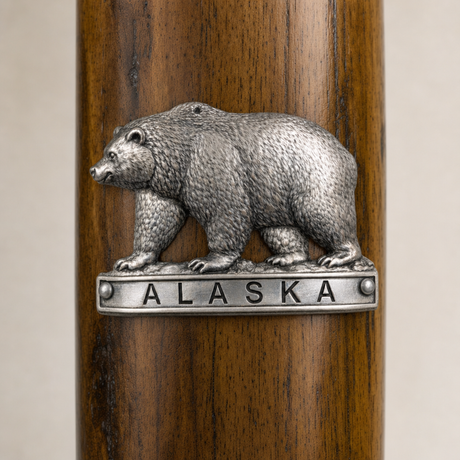 Alaska Bear hiking stick medallion installed on a wooden hiking staff