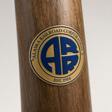 Alaska Railroad Corporation hiking stick medallion installed on a wooden hiking staff