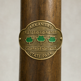 Village Creek State Park Logo hiking stick medallion installed on a wooden hiking staff