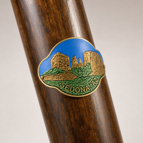 Sedona hiking stick medallion installed on a wooden hiking staff