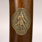 Tubac State Historical Site hiking stick medallion installed on a wooden hiking staff