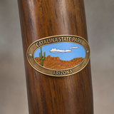 Catalina State Park hiking stick medallion installed on a wooden hiking staff