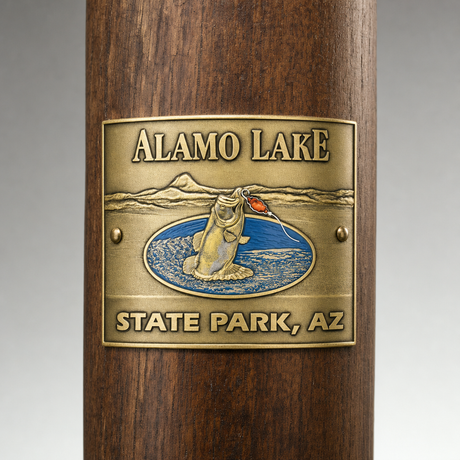 Alamo Lake State Park hiking stick medallion installed on a wooden hiking staff