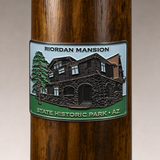 Riordan Mansion State Park hiking stick medallion installed on a wooden hiking staff