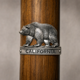 California Bear hiking stick medallion installed on a wooden hiking staff
