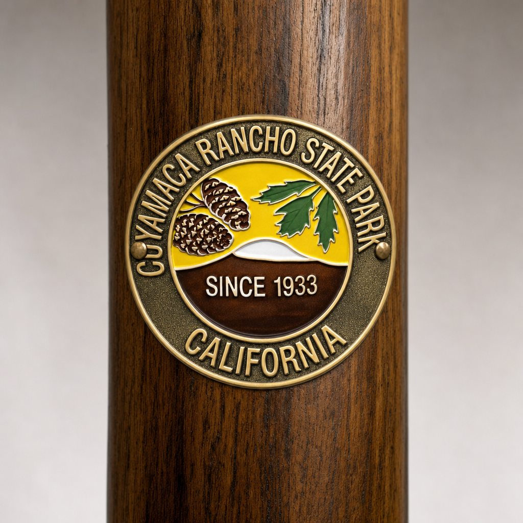 Cuyamaca Rancho State Park Logo hiking stick medallion installed on a wooden hiking staff