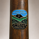 Lava Beds National Monument hiking stick medallion installed on a wooden hiking staff