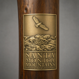 Santa Monica Mts National Recreation Area hiking stick medallion installed on a wooden hiking staff