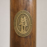 Richardson Grove State Park hiking stick medallion installed on a wooden hiking staff