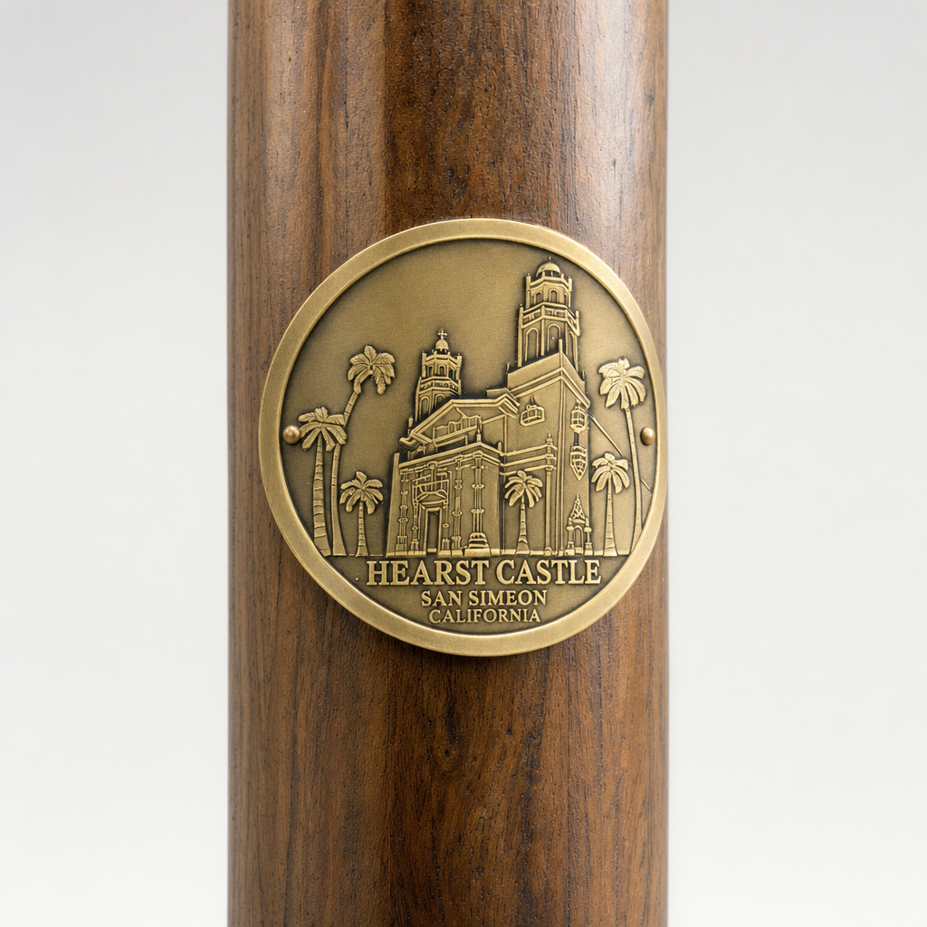 Hearst Castle - San Simeon hiking stick medallion installed on a wooden hiking staff