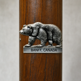 Banff Canadian National Park Bear hiking stick medallion installed on a wooden hiking staff