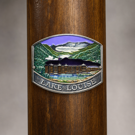 Lake Louise Canadian National Park hiking stick medallion installed on a wooden hiking staff