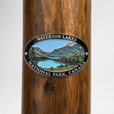 Waterton Lakes hiking stick medallion installed on a wooden hiking staff