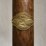 Catoctin Mountain State Park hiking stick medallion installed on a wooden hiking staff