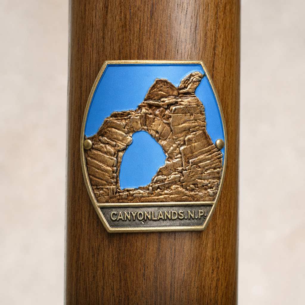 Canyonlands National Park hiking stick medallion installed on a wooden hiking staff