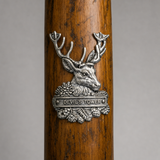 Devil's Tower National Monument Deer hiking stick medallion installed on a wooden hiking staff