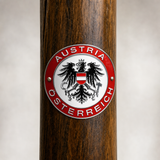 Austria hiking stick medallion installed on a wooden hiking staff