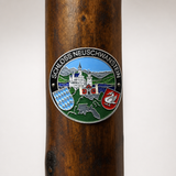Schloss Neuschwanstein hiking stick medallion installed on a wooden hiking staff