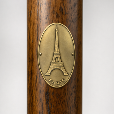 Paris Eiffel Tower hiking stick medallion installed on a wooden hiking staff