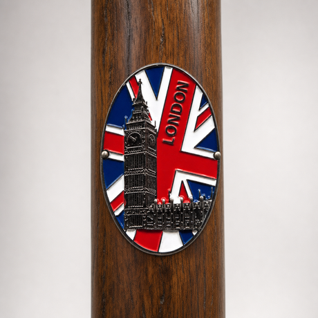 London hiking stick medallion installed on a wooden hiking staff