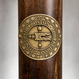 Freedom Trail - Boston National Millennium Trail hiking stick medallion installed on a wooden hiking staff