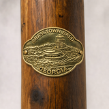 Brasstown Bald State Park hiking stick medallion installed on a wooden hiking staff