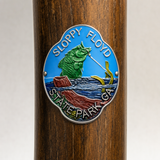 Sloppy Floyd State Park hiking stick medallion installed on a wooden hiking staff