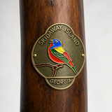 Skidaway Island State Park hiking stick medallion installed on a wooden hiking staff