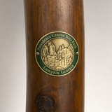 Providence Canyon State Park hiking stick medallion installed on a wooden hiking staff