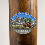 Mt. Wheeler National Park hiking stick medallion installed on a wooden hiking staff