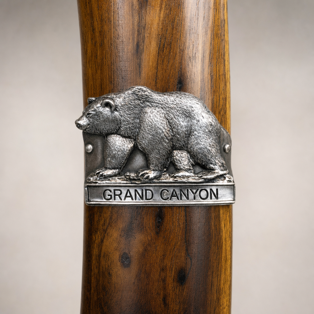 Grand Canyon National Park Area Bear hiking stick medallion installed on a wooden hiking staff