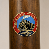 Grand Canyon Railway National Historic Places hiking stick medallion installed on a wooden hiking staff