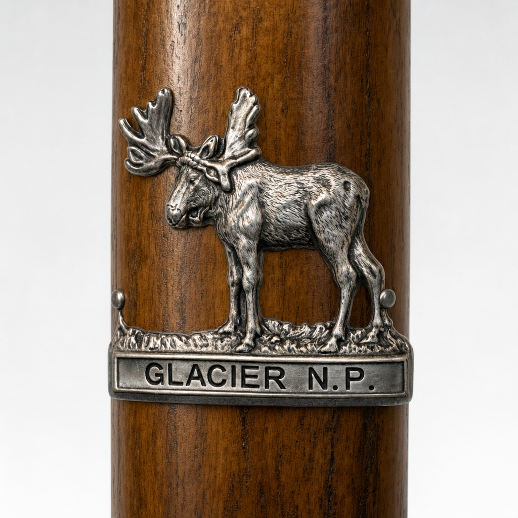 Glacier National Park National Park Moose hiking stick medallion installed on a wooden hiking staff