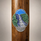 Great Smoky Mt. National Park Laurel Falls hiking stick medallion installed on a wooden hiking staff