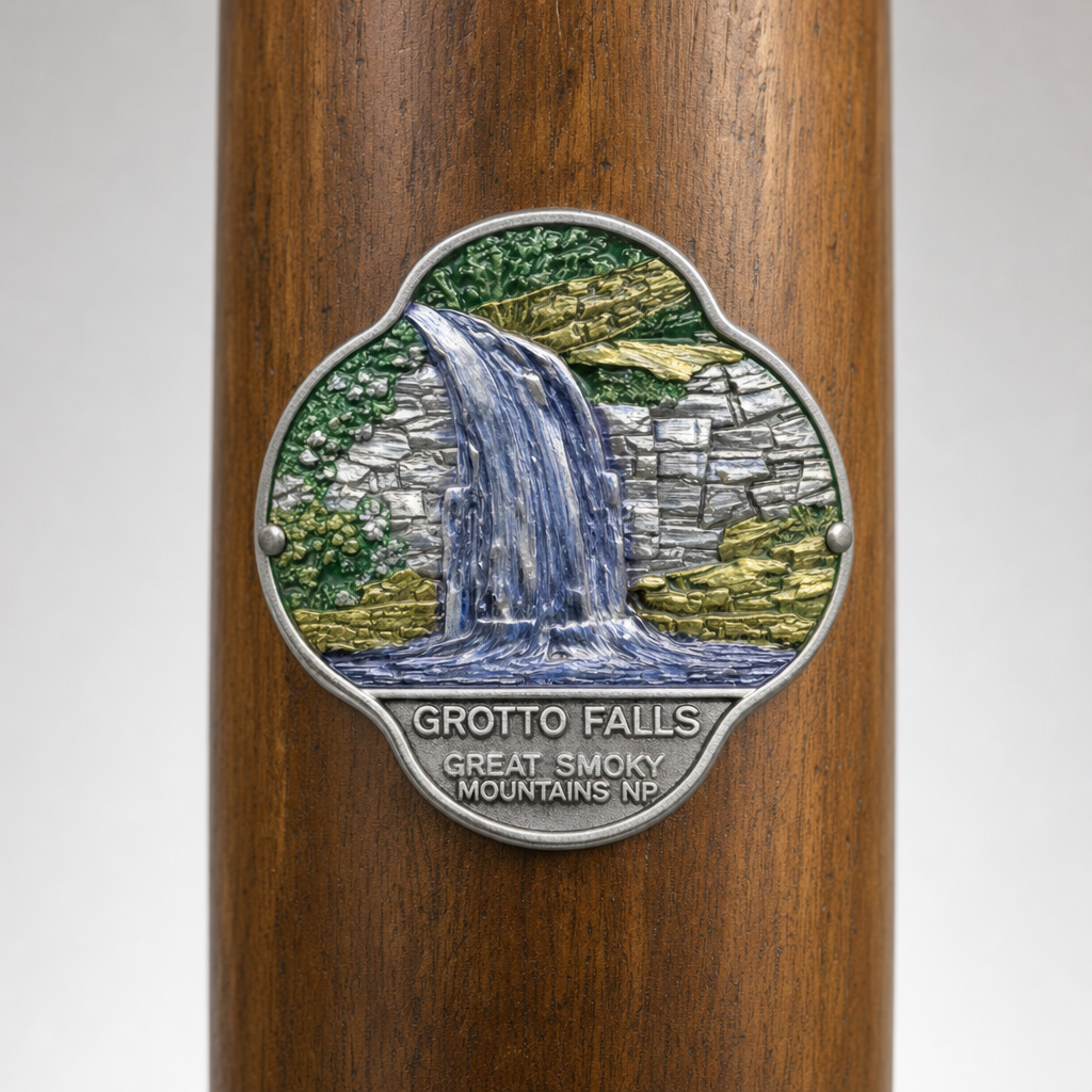 Great Smoky Mt. National Park Grotto Falls hiking stick medallion installed on a wooden hiking staff